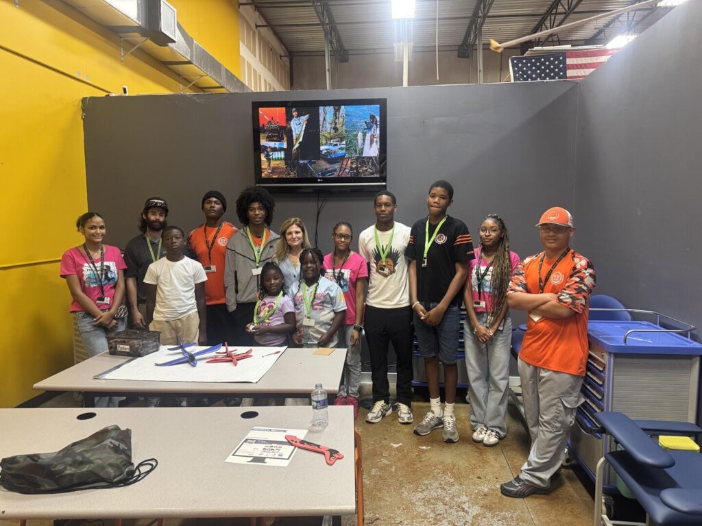 STEMCAT students with their instructor at a workshop