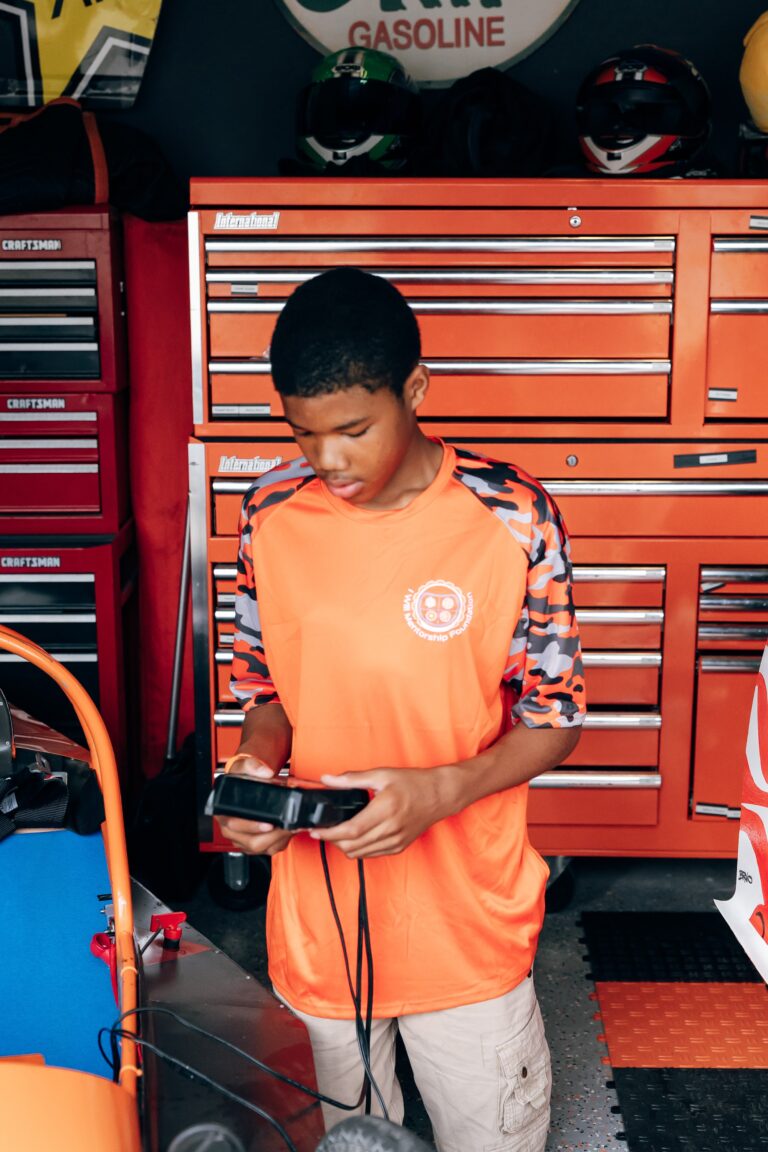 STEMCAT student working at a tool bench